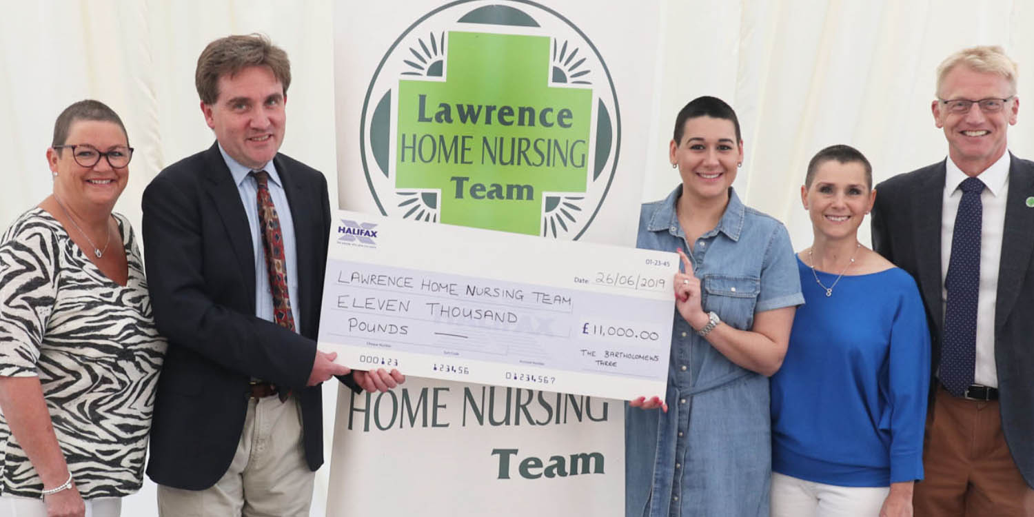 Fundraisers present Lawrence Nurses with a huge cheque